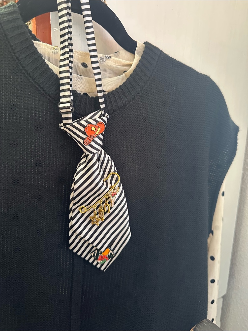 Striped Black & White Neck Tie with Gold Charm Accent